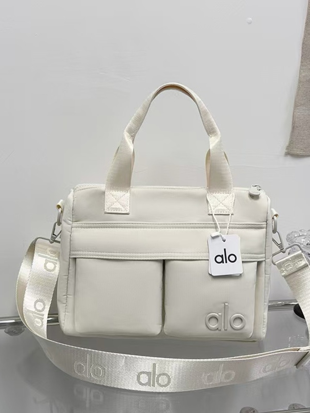 ALO Yoga Men’s Cream Messenger Bag with Branded Strap
